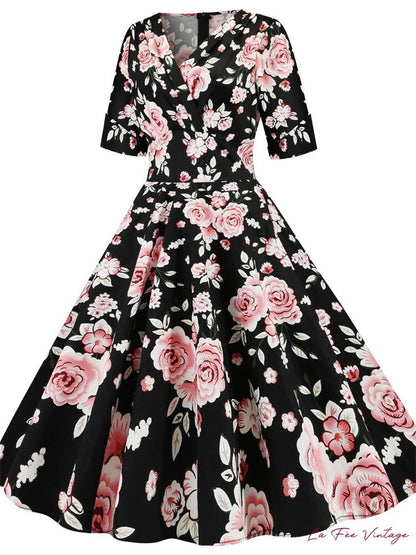 Robe d'été noire à fleurs pin-up vintage années 50