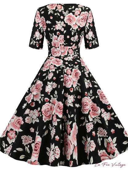 Robe d'été noire à fleurs pin-up vintage années 50