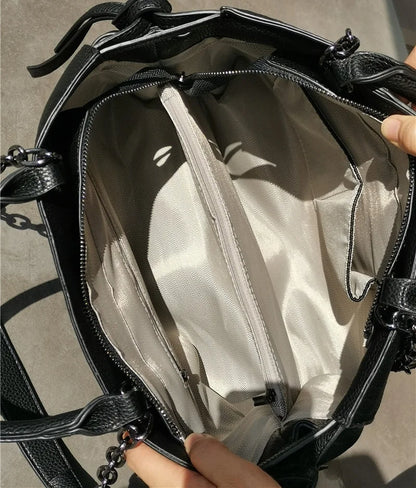 Sac à main style cuir noir vintage